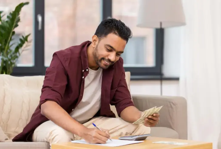 Person budgeting calmly at home